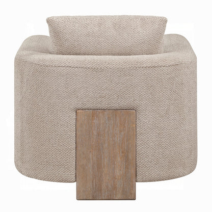 Rear view of Arden accent chair showing the curved upholstered back and wood panel support