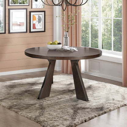 Chestnut Ridge 47 inch round dark brown dining table in a bright dining room